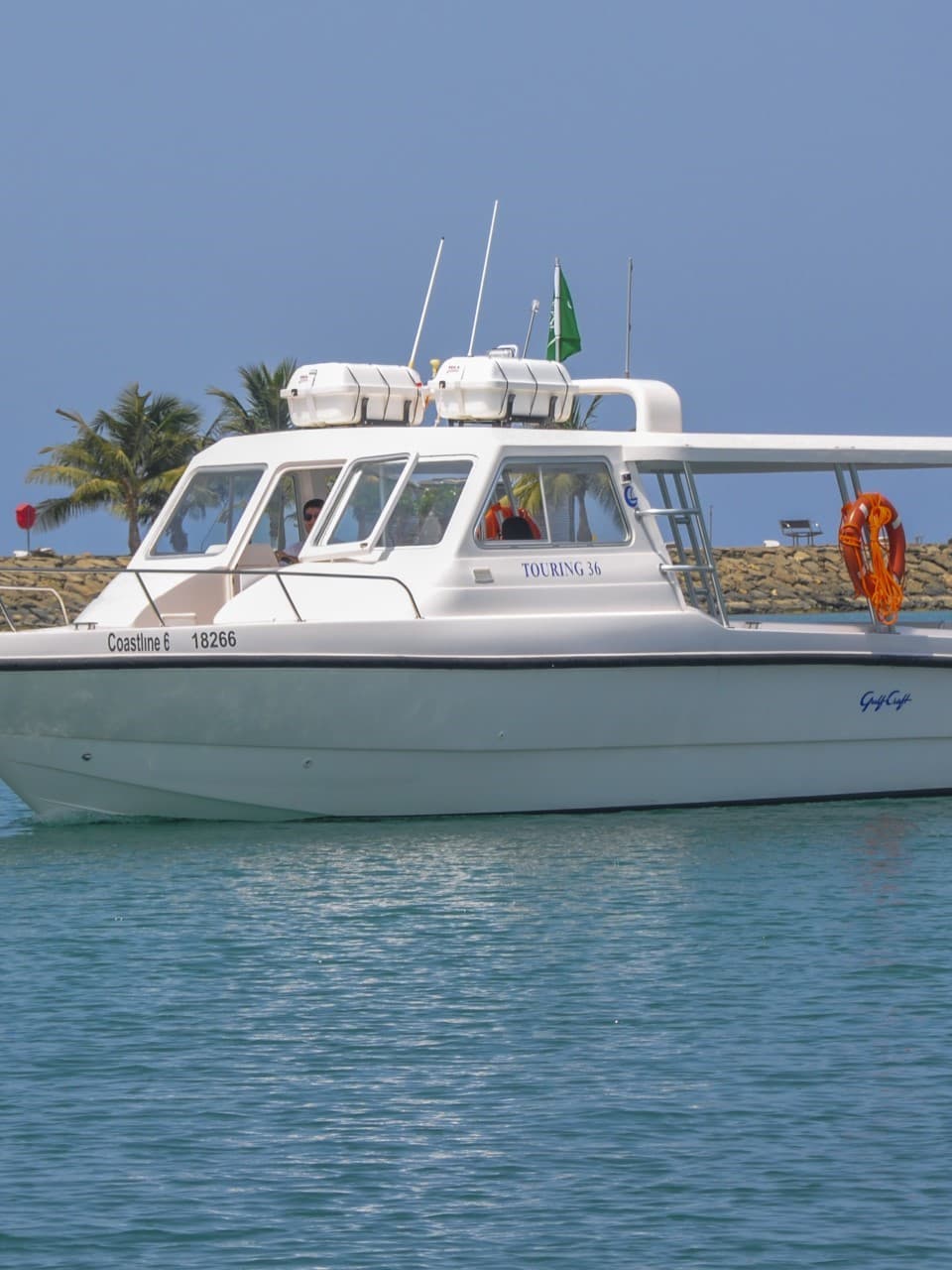 Coastline search and rescue vessel on the water, marked for emergency response.